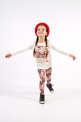 Image showing Little girl in dance creations with red hat