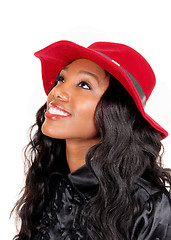 Image showing Black woman with red hat.