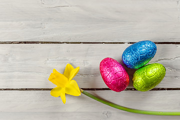 Image showing Easter eggs on a wooden table