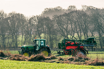 Image showing Tractor with fertilizer on a field