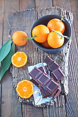 Image showing chocolate and tangerines