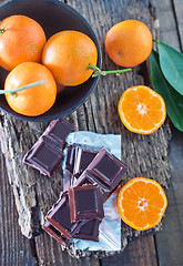 Image showing chocolate and tangerines