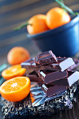 Image showing chocolate and tangerines