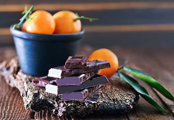 Image showing chocolate and tangerines