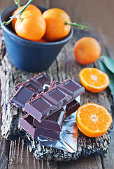 Image showing chocolate and tangerines