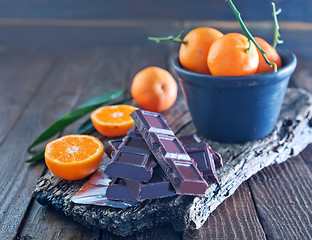 Image showing chocolate and tangerines