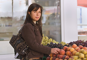 Image showing Woman buying fruits