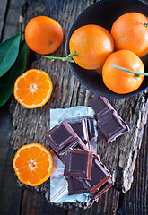 Image showing chocolate and tangerines