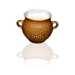 Image showing pot with milk