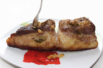 Image showing baked piece of meat on the plate