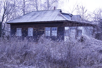 Image showing Old rural house covered by hoarfrost