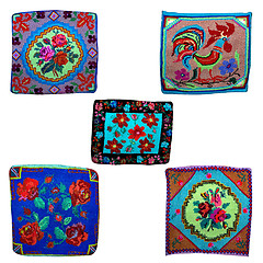 Image showing five embroidered cushions