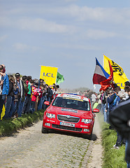 Image showing Official Red Car on the Roads of Paris Roubaix Cycling Race