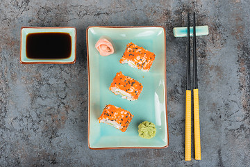 Image showing Sushi rolls on the table. Top view. 