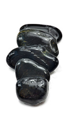 Image showing Stack of black stones  