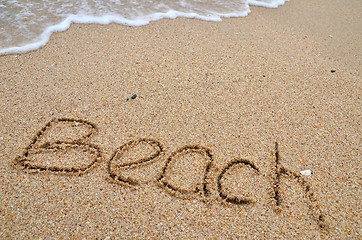 Image showing Beach word written on the sandy beach