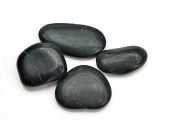 Image showing Stack of black stones indicate the concept of balance