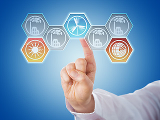 Image showing Finger Pushing Hexagonal Renewable Energy Icons