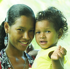 Image showing editorial latina woman mother with baby daughter