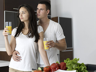 Image showing happy young couple in kicthen