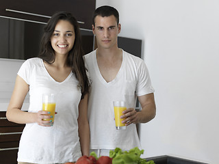 Image showing happy young couple in kicthen