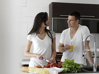 Image showing happy young couple in kicthen