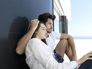 Image showing young couple making selfie together at home