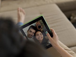 Image showing young couple making selfie together at home