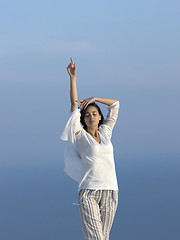 Image showing young woman enjoy sunset