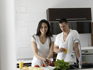 Image showing happy young couple in kicthen