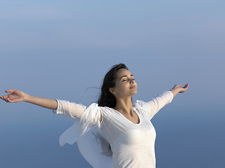 Image showing young woman enjoy sunset