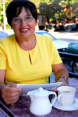 Image showing Mature woman reading