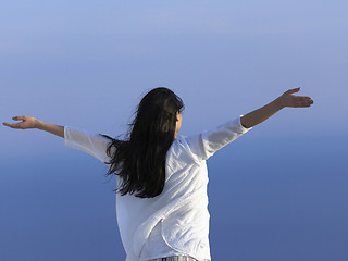 Image showing young woman enjoy sunset