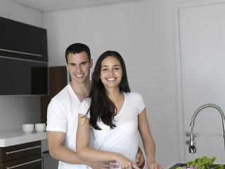 Image showing happy young couple in kicthen