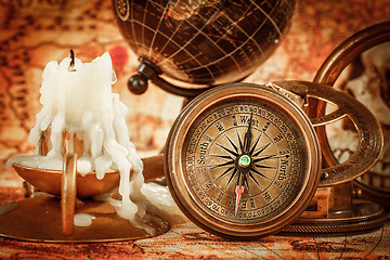 Image showing Vintage still life. Vintage items on ancient map.