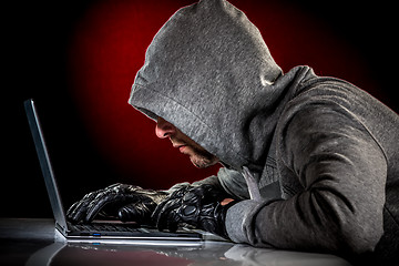 Image showing Hacker with laptop