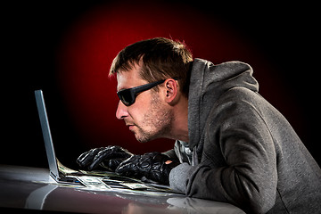 Image showing Hacker with laptop