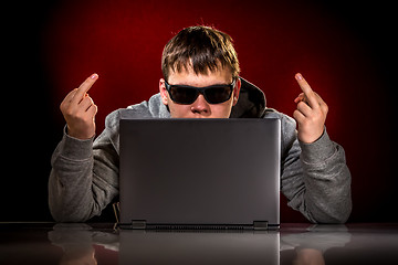 Image showing Hacker with laptop