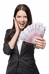Image showing Excited woman giving euro money