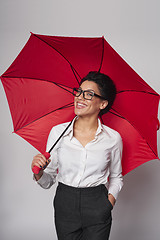 Image showing Happy woman with umbrella