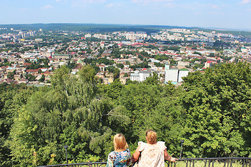 Image showing two women watching to open space above Lvov city