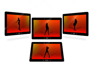 Image showing tablets with red image of dancing woman isolated