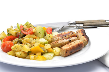 Image showing Mixed Potato salad with sausages