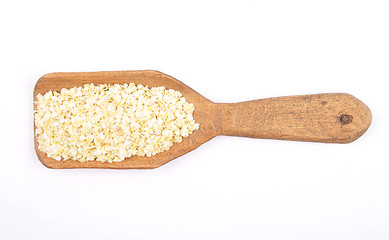 Image showing Millet flakes on shovel