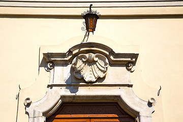 Image showing  church door   in italy  lombardy   shell street lamp