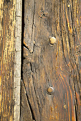 Image showing  in a the mozzate rusty    door curch  closed wood italy  lombar