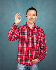 Image showing Asian Man With Folded Hands