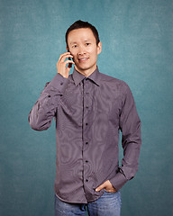 Image showing Asian Man With Folded Hands