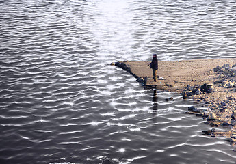 Image showing  Angler at sunset