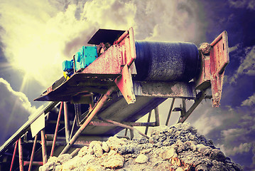 Image showing Conveyor against stormy cloudscape